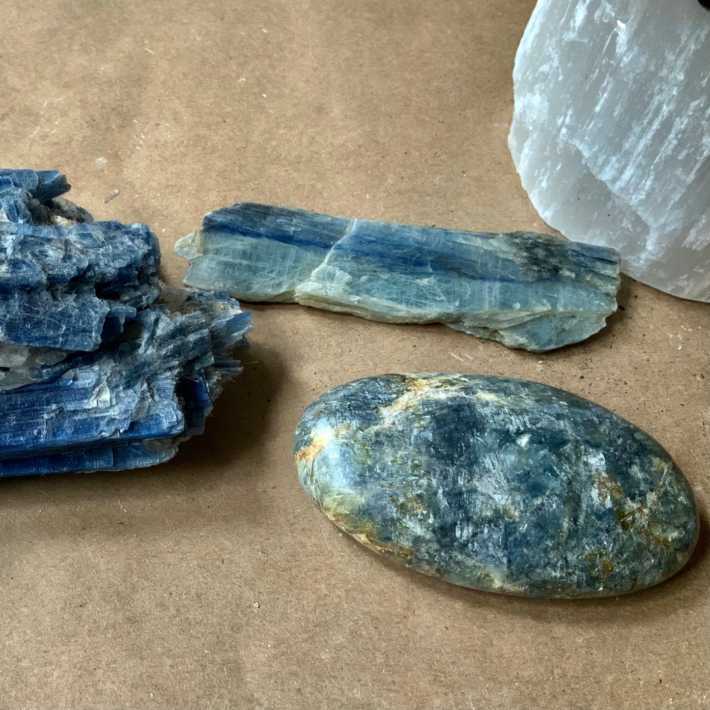 polished palm stone and pillow pillow piece blue kyanite