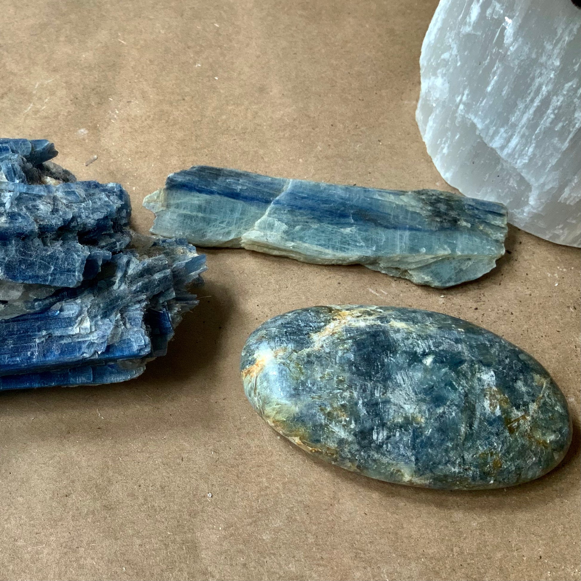 polished palm stone and pillow pillow piece blue kyanite